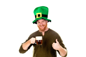 Red haired guy with green hat drinking a beer