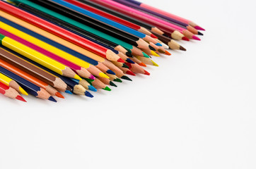 Fototapeta premium Color pencils isolated on white clean background close up