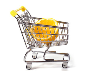 Basket of fresh lemons isolated on a white background. Vitamin C. Shopping trip.