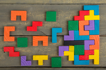 Creative solution for idea - business concept, jigsaw puzzle on the wooden desk