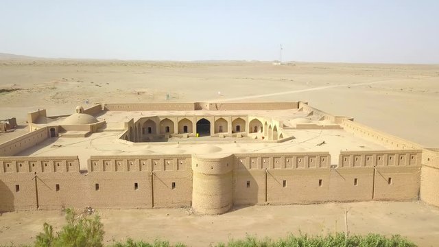 The Maranjab Desert's Caravanserai. It was the way of the Silk Road between Europe and China. Panoramic top view from the side of the caravanserai. Visible to the roof, courtyard, entrances to rooms