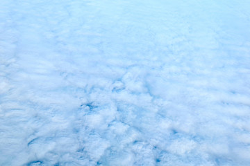 View over the clouds and blue sky.