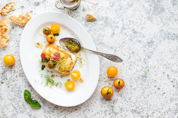 Pan-fried salty feta cheese coated in breadcrumbs