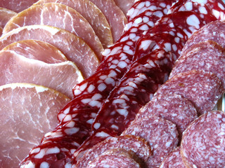 meat cuts for the festive table: balyk, salami sausage, smoked cured sausage