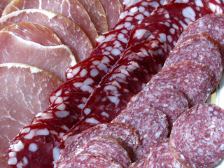 meat cuts for the festive table: balyk, salami sausage, smoked cured sausage