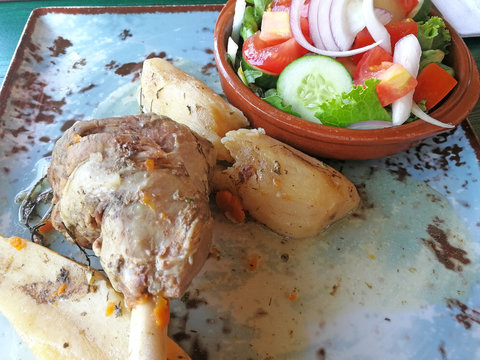 Kleftiko dish cuisine of Cyprus. Stewed lamb meat served with vegetables, herbs and mashed potatoes