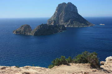 The magical island of Es Vedra with the small islet of Es Vedranell next to it in front of the...