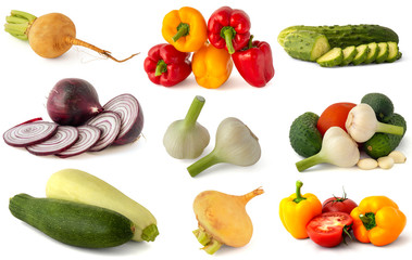 Red onions garlic zucchini cabbage turnip cucumbers tomatoes Bell peppers from the autumn harvest on a white background