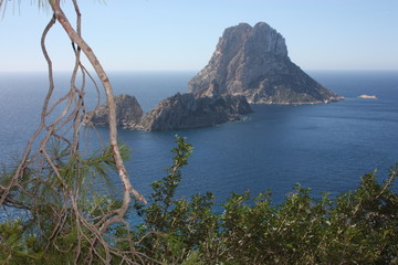The magical island of Es Vedra with the small islet of Es Vedranell next to it in front of the...