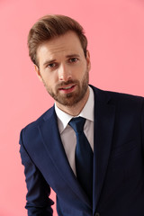 Close up of a nervous businessman looking forward