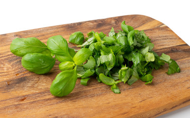 Fresh Green Chopped Basil Leaves Isolated on White Background