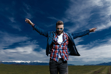 Dreaming fashion model imitating flying