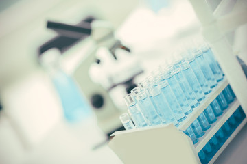 close up. tubes of blue liquid in the science lab