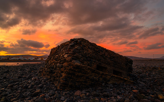 atardecer en la playa en el zulo de guerra