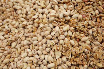 background of mixed pistachios and walnut. Smart food