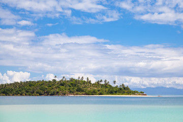Tropical island with a white sandy beach.