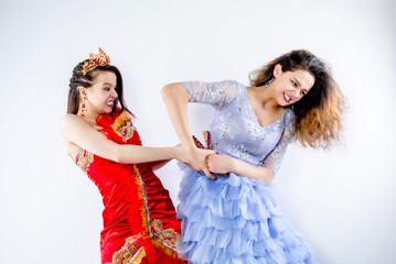 Two women having argue fight being mad at each other. Two sisters fight because of competition at...