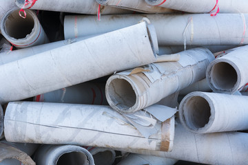 Textures of discarded paper in waste material storage.