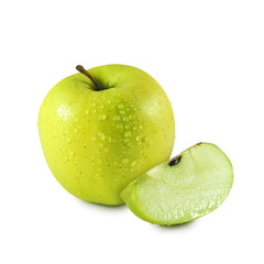 Wet yellow apple covered with water drops and juicy slice isolated on white background