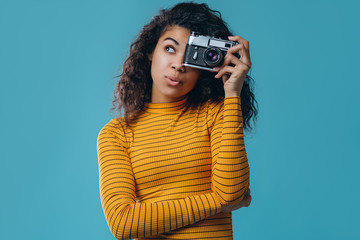 African american woman isolated on blue background.