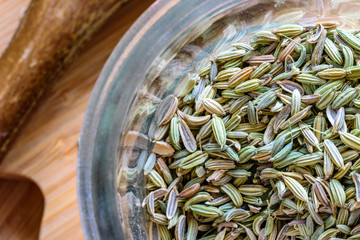 fennel seeds loose inside glass jar ready to be brewed as tea