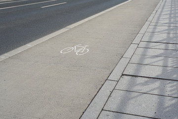 A bike lane next to a street