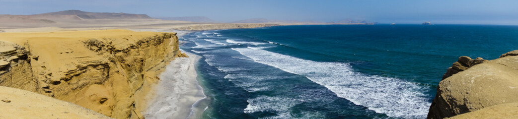 cliffs and beach in Paracas National Reserve. Arid touristic zone in the coast of Ica/Peru.