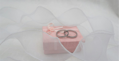 wedding concept. Two rings on a white background.
