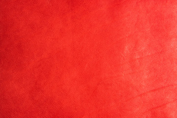 background from texture of red genuine leather. natural background