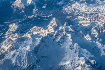 Fototapeta premium View from the plane to the Alps - Dolomites in Italy