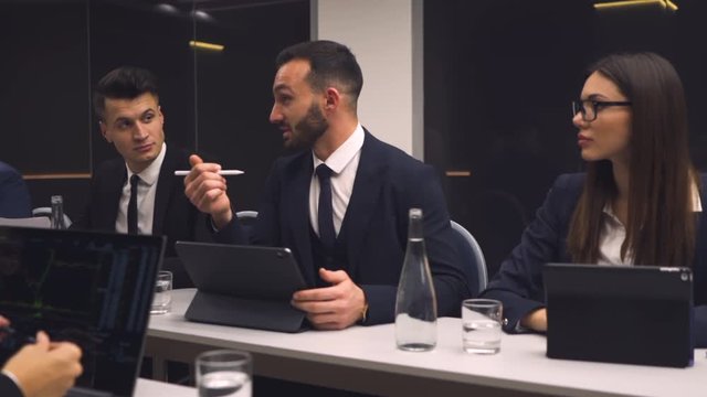 The young businessman speaks at the conference. slow motion