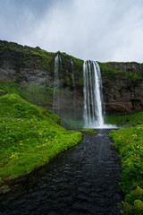 Obraz premium Seljalandsfoss in Iceland, on a cloudy day with river