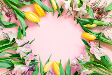 Pink background with spring flowers, festive composition for spring holidays