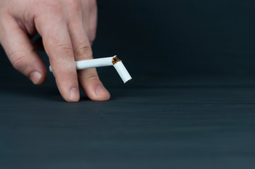 cigarette in the fingers, a concept of male dysfunction