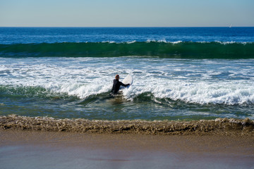 surfer on the beach