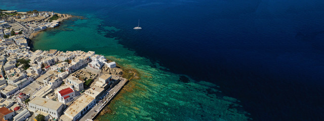 Aerial drone ultra wide photo of famous area of Little Venice in old town of Mykonos island, Cyclades, Greece