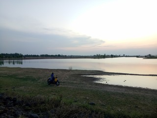 Sunset on The Huai Sawai Reservoir.
