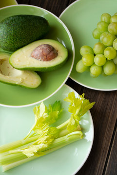 fresh green vegetables and fruits, top view image