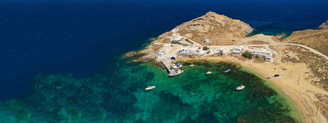 Aerial drone ultra wide photo of famous beach of Agia Anna in island of Mykonos, Cyclades, Greece