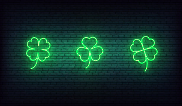 Clover neon icons. Set of green Irish shamrock icons for Saint Patrick's Day
