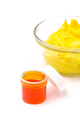 Opened Pot of Yellow Gel Food Coloring for Baking Isolated on a White Background