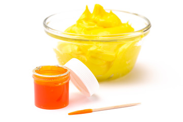 Opened Pot of Yellow Gel Food Coloring for Baking Isolated on a White Background
