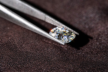 Diamond in Tweezers Close up