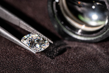 Diamond in Tweezers Closeup