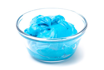 Bowls of Brightly Colored Icing Mixed withed with Gel Food Coloring