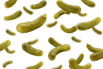 marinated pickled cucumbers isolated on white background, selective focus