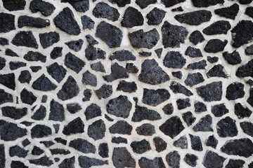 Abstract close up old stone wall of a building