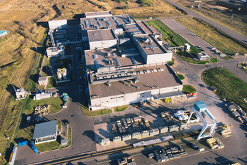 Warehouse storage or industrial factory or logistics center from above, aerial view.