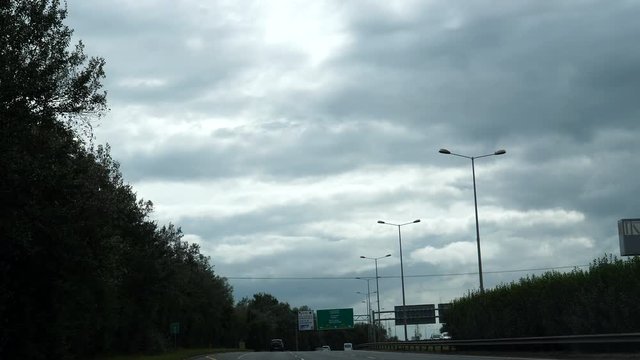 Passenger car windshield view driving N7 highway in Republic of Ireland.
