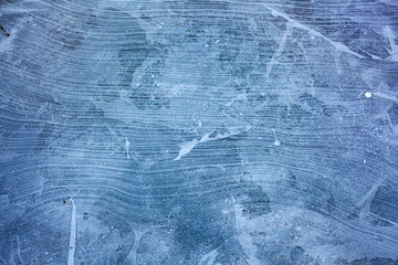 Beautiful texture of frozen water. Ice surface on the river. Natural background of a cold shade. Early winter. Harmony of shades of crystallized water. Low temperature.